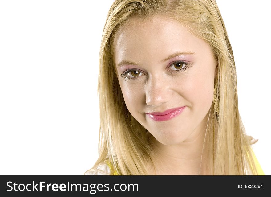 A portrait of a beautiful blond smiling Caucasian young girl (15-24) on white background, model release. A portrait of a beautiful blond smiling Caucasian young girl (15-24) on white background, model release.