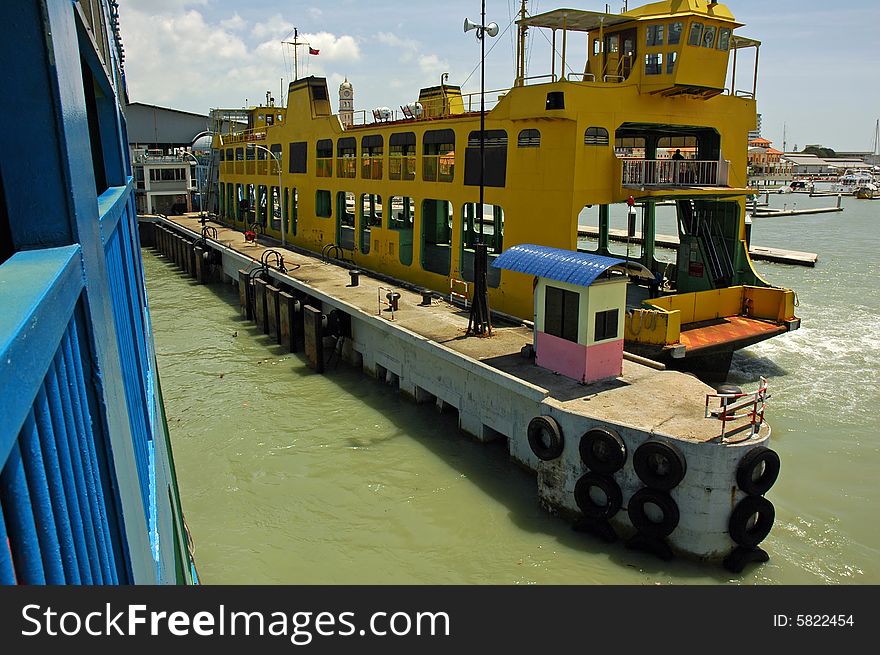 Ferry at the pier ready to depart. Ferry at the pier ready to depart