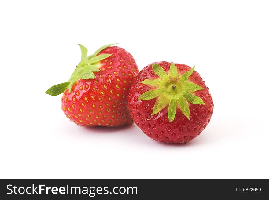 Two healthy and ripe red strawberries
