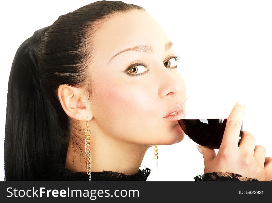 Portrait of a cute brunette holding a glass of red wine on white background. Portrait of a cute brunette holding a glass of red wine on white background