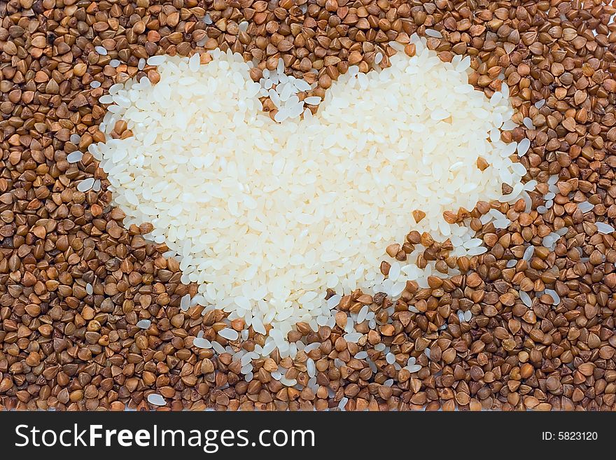 Vegetarian concept - heart from buckwheat and rice for your design for your design