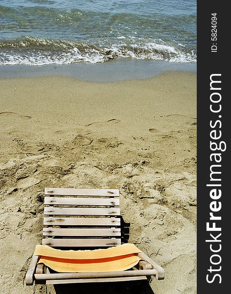 Wooden seat on the beach. Wooden seat on the beach