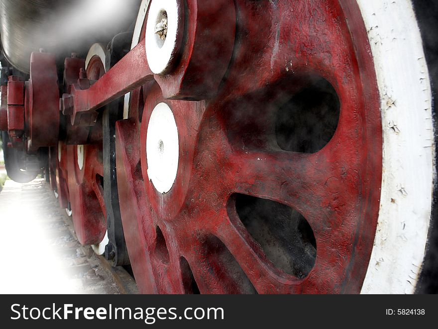 The wheel of an outdated vapour locomotive, it has already had a history of 80 years. The wheel of an outdated vapour locomotive, it has already had a history of 80 years.