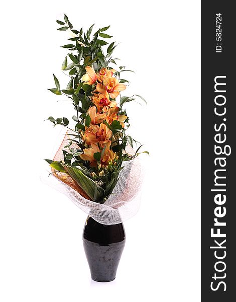 Beautiful bouquet of orange orchid isolated on white