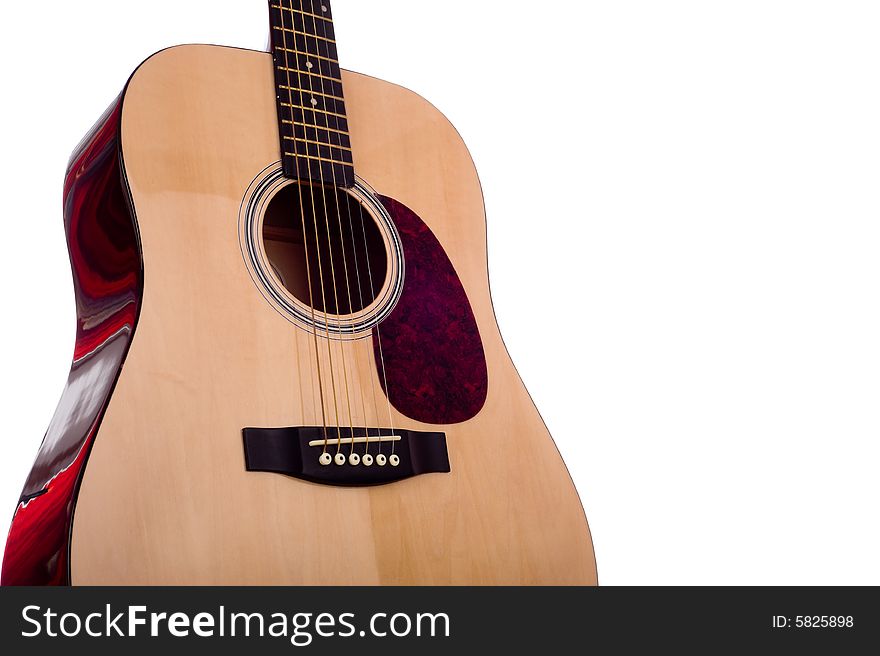A classic dreadnought acoustic guitar on a white background. A classic dreadnought acoustic guitar on a white background