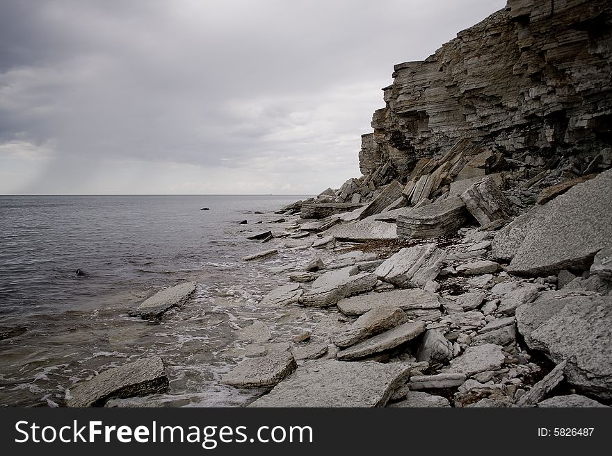 Cliffs on a Baltic sea shore in a stormy weather