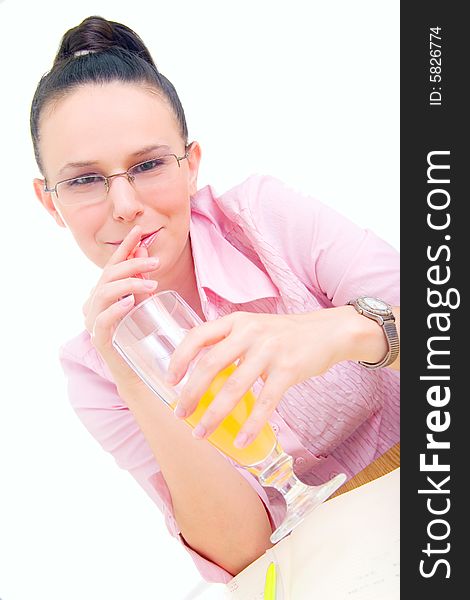 Portrait of young businesswoman drinking juice, isolated on white background