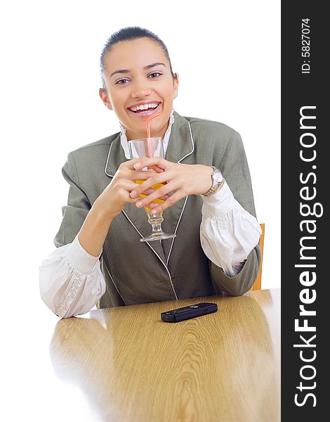 Cheerful businesswoman drinking juice on her break