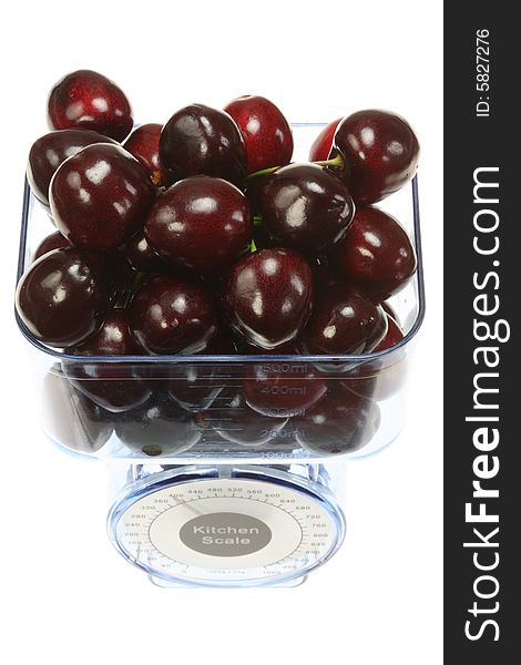 Kitchen Scales And Cherries.