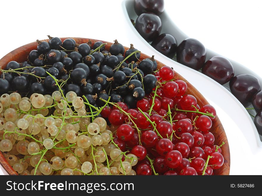 Bowls of currants and cherries. Bowls of currants and cherries.
