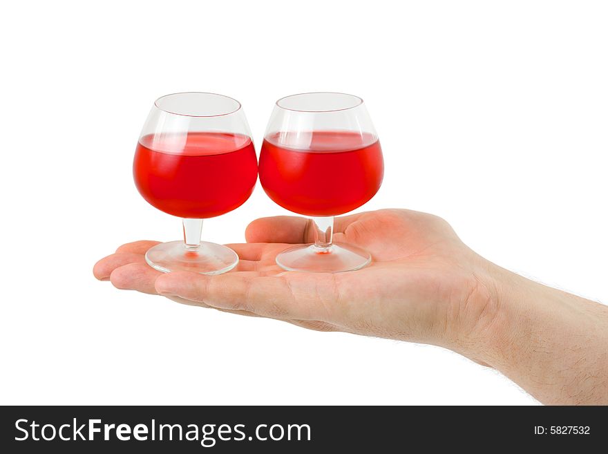 Hand and wineglasses isolated on white background