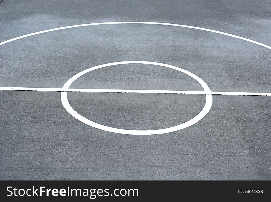 Basketball court lines on a street court