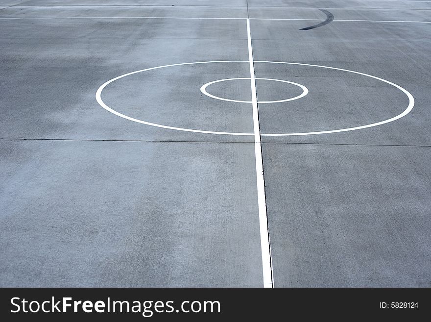 Basketball court lines on a street court