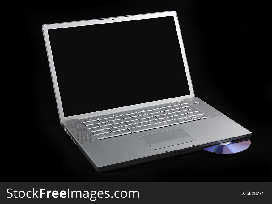 Laptop Isolated With CD