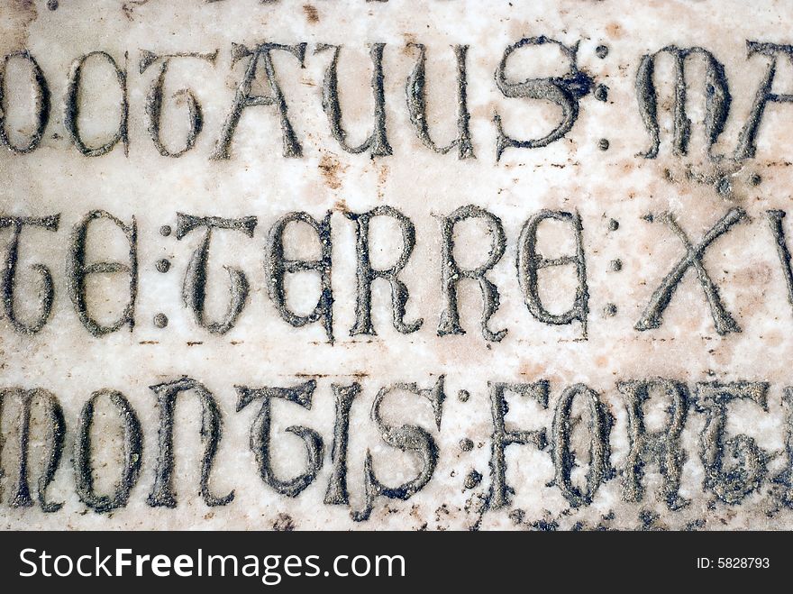Antique Latin characters on the crusaders stone. Antique Latin characters on the crusaders stone