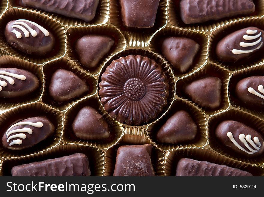 Chocolate sweets in box close up