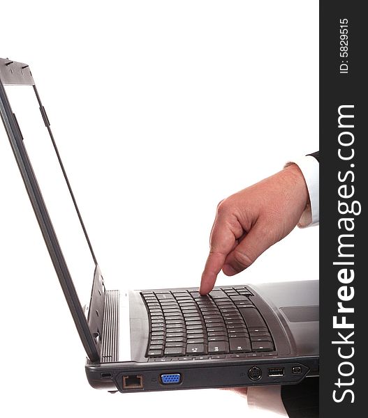 Man's hand on a laptop isolated on white