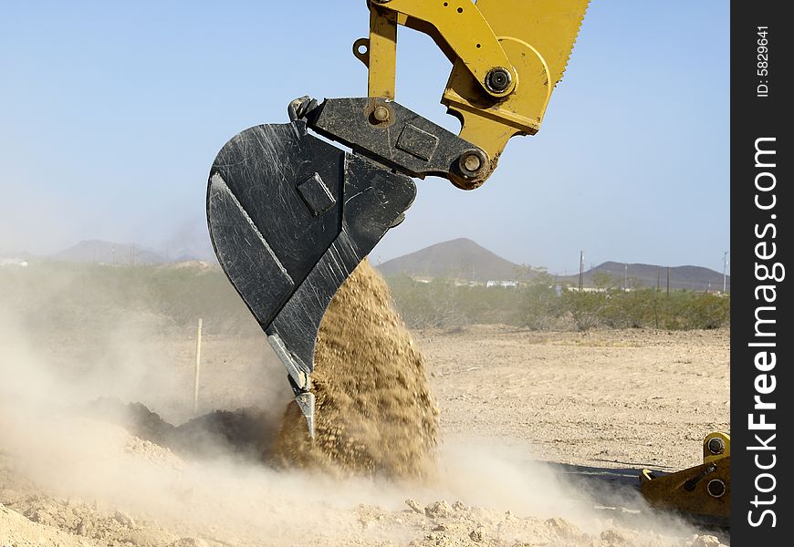 Giant Steam Shovel Releasing Dirt- Horizontal
