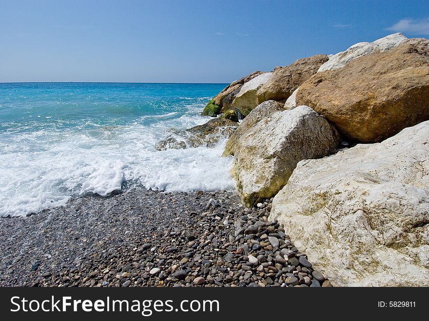 Waves coming to a gravel beach. Waves coming to a gravel beach