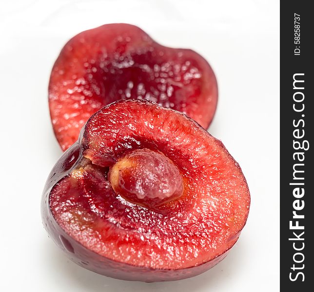 Fresh ripe cherry on white background, close up photo. Fresh ripe cherry on white background, close up photo.