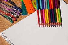 Colored Pencils, Pens, A Ruler With A White Notebook Stock Images Colored Pencils, Pens, A Ruler With A White Notebook Stock Images