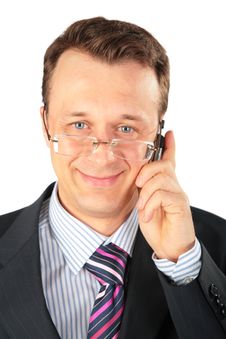 Businessman In Glasses Speaks On Cell Phone Stock Images