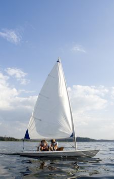 Free Man And Woman Sailing On Lake - Vertical Stock Photography - 5831492