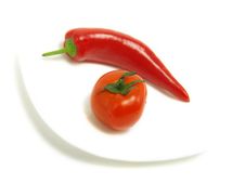 Fresh Ripe Tomato And Chili Pepper Stock Photos
