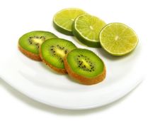 Sliced Lime And Kiwi On Plate Stock Photography Sliced Lime And Kiwi On Plate Stock Photography