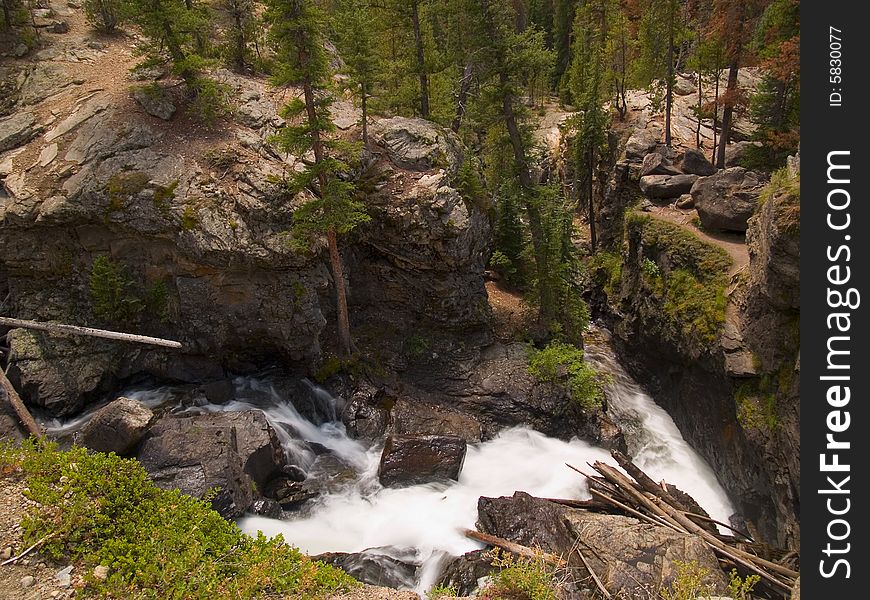 Adams Falls twists as it descends through Rocky Mountain National Park. Adams Falls twists as it descends through Rocky Mountain National Park