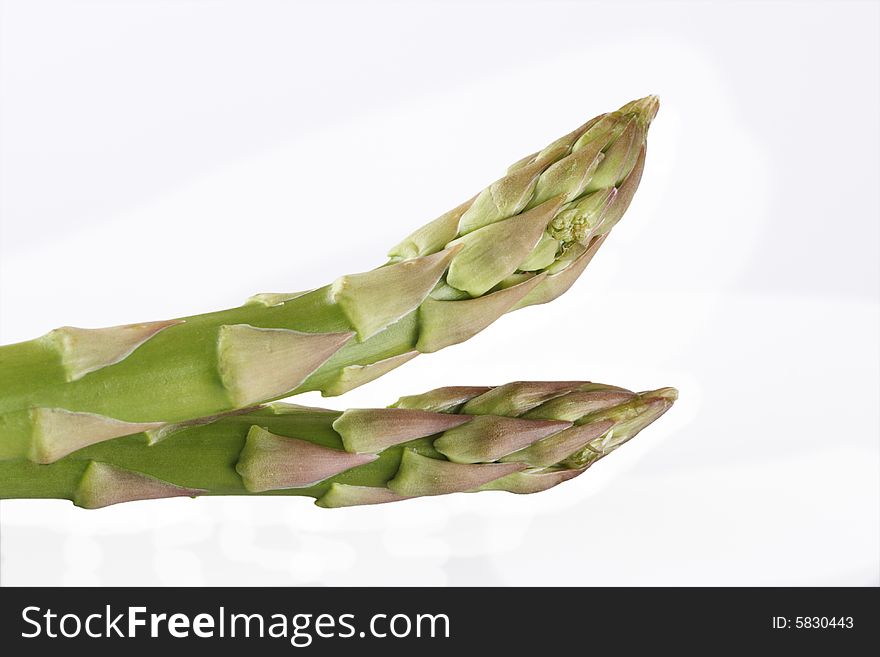 Two Asparagus Spears Isolated Over White Backgrond