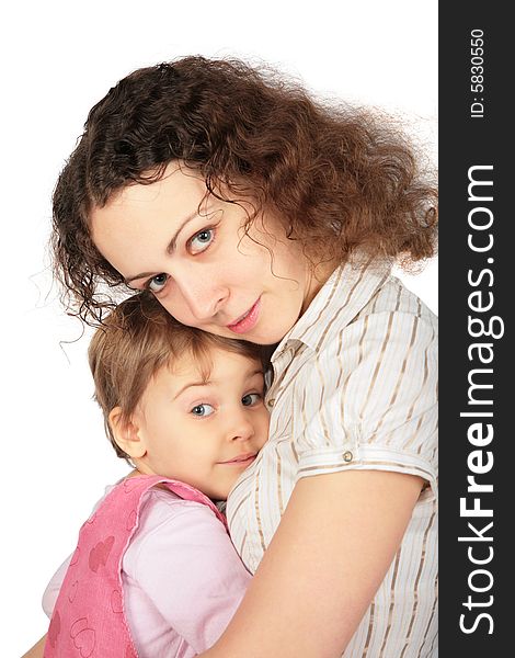 Girl embraces mother on white