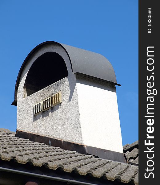 A particular shot of a modern roof in tyroler style. A particular shot of a modern roof in tyroler style