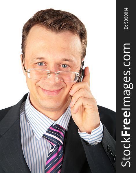 Businessman In Glasses Speaks On Cell Phone