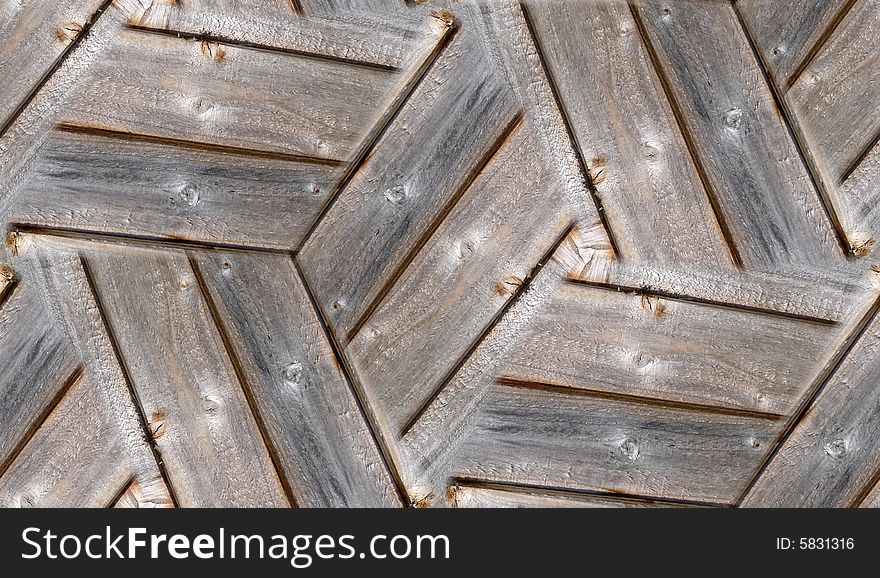 A seamless tile pattern texture background, made from a wooden fence. A seamless tile pattern texture background, made from a wooden fence.