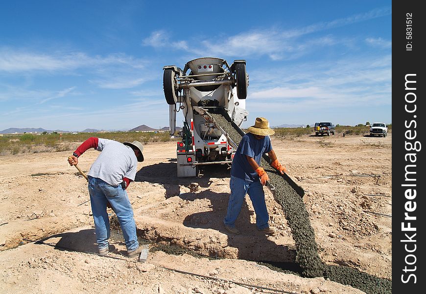 Cement Truck Pouring Cement Into Hole - Horizontal