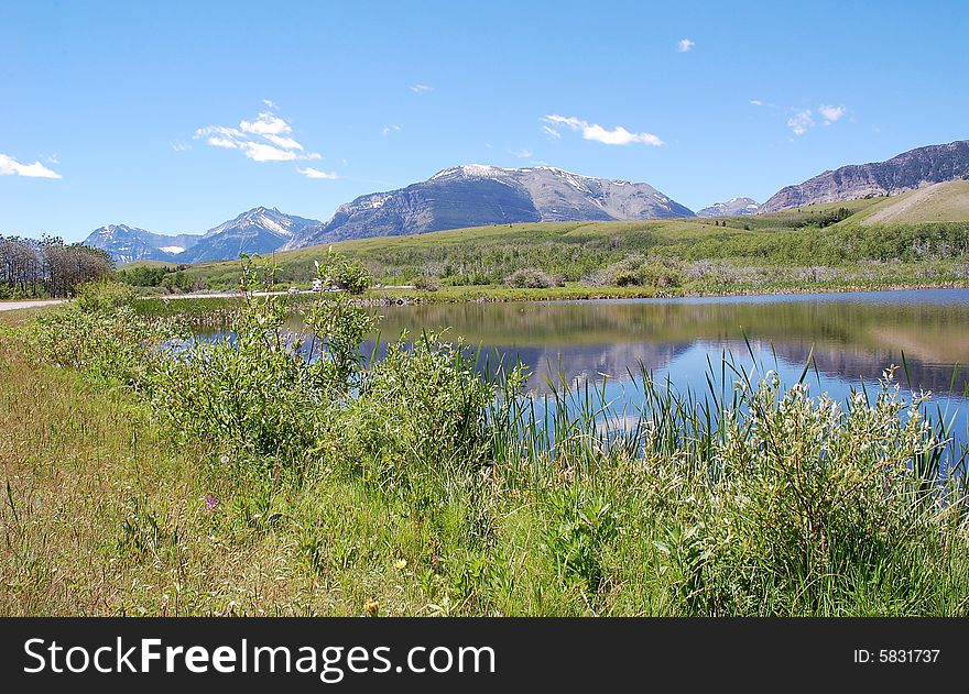 Mountains, Lake And Grassland