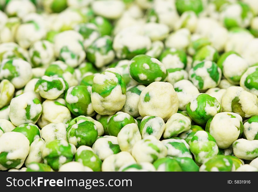 Close up of a pile of coated green peas. Close up of a pile of coated green peas.