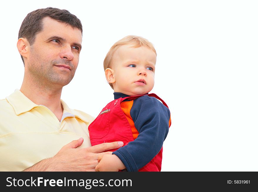 The father holds child on hands