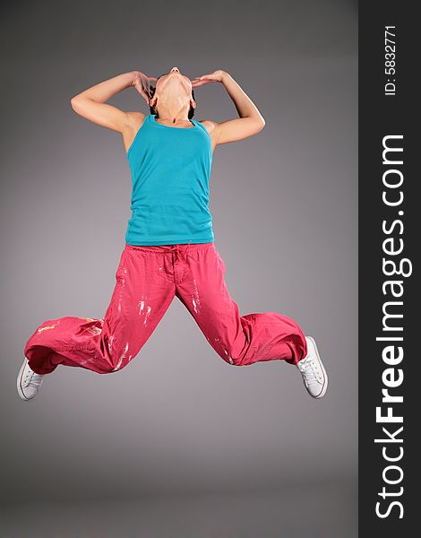 Woman In Sportswear In Jump