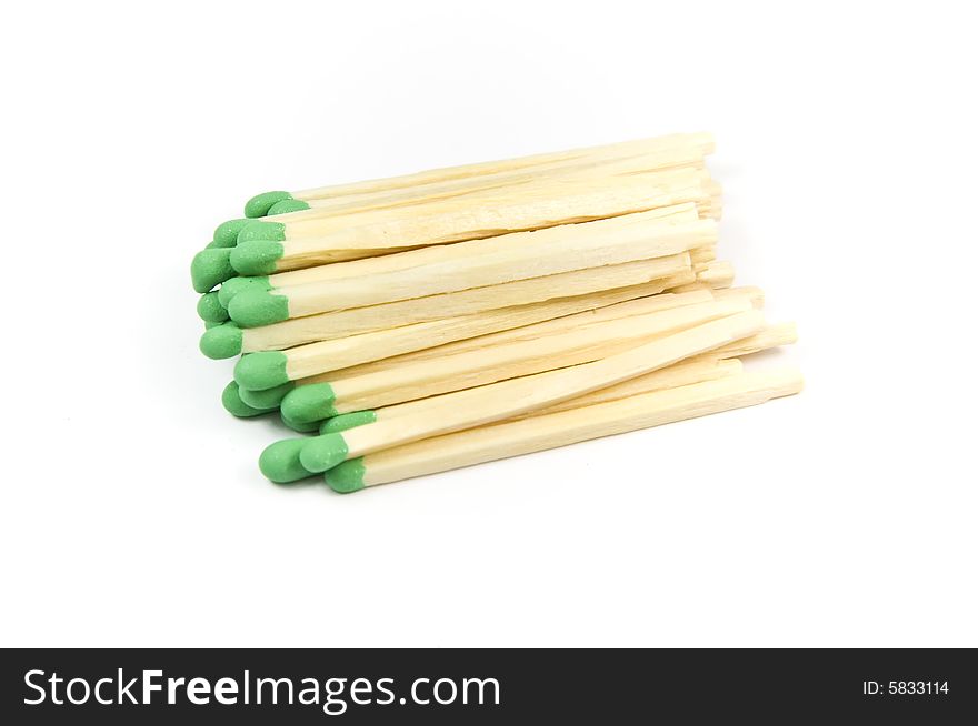 Green wooden matches isolated on white background