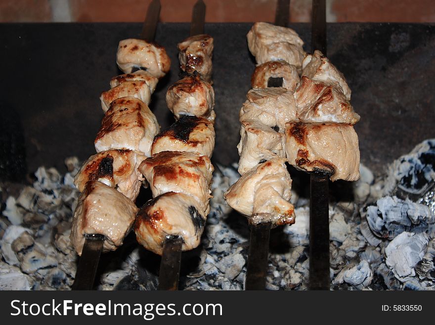 Cooking of a kebab on a summer residence. Cooking of a kebab on a summer residence