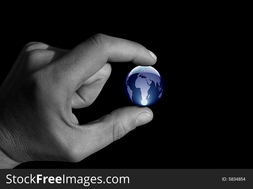 A black and white hand holding the world. A black and white hand holding the world