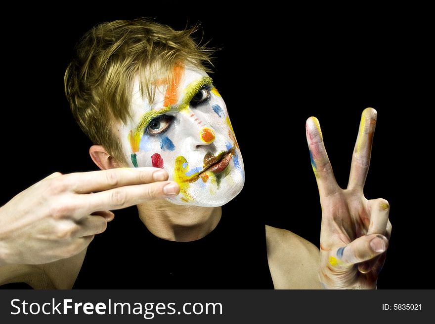 Clown portrait on a black background. Clown portrait on a black background