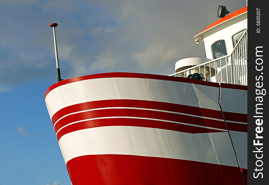 Prow of a ferry boat - cloudy background