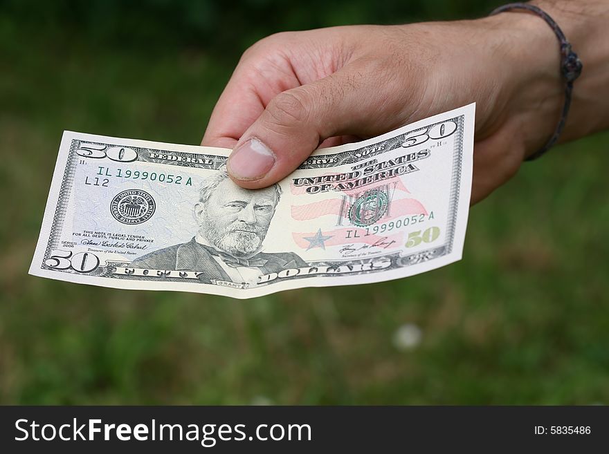 Hand With Dollars