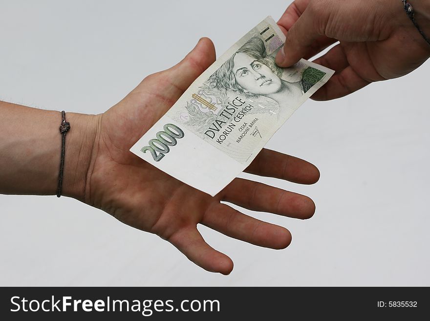 Two manÂ´s hands with banknote. Two manÂ´s hands with banknote