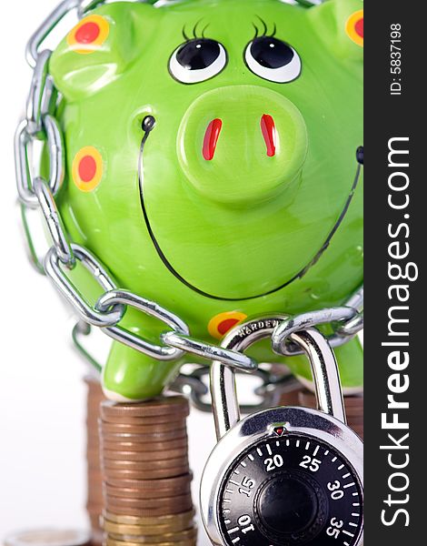 Piggy bank locked in chain