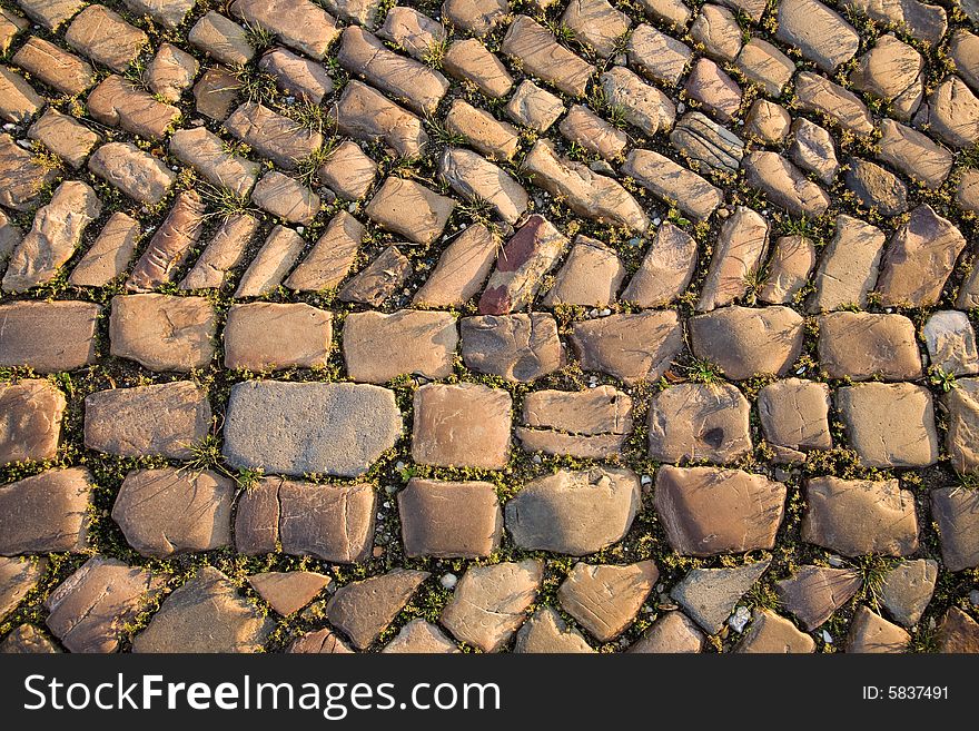Stone structure of old Prague road. Background texture. Stone structure of old Prague road. Background texture.