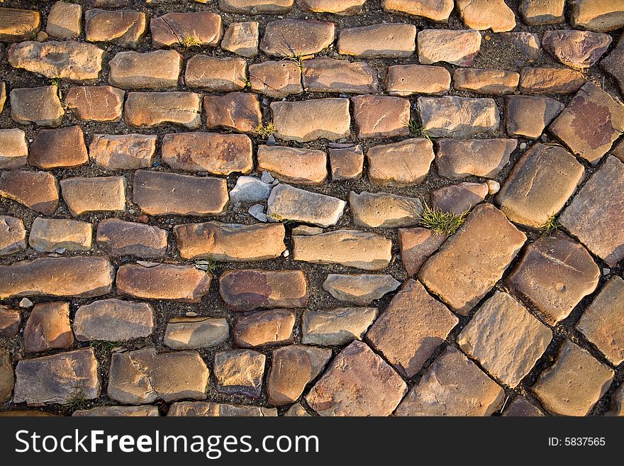 Stone structure of old Prague road. Background texture. Stone structure of old Prague road. Background texture.